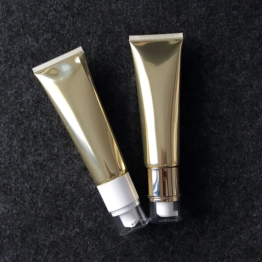 50G Empty Plastic Gold and Silver PE Soft Tube with Pump Cap Plastic Clearing Tube UV Printing Label Airless Squeeze Bottle