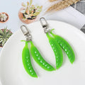 Factory Price Snow Peas Keychain OEM PVC Figure Toys Plastic Miniature Scale Model Collective Figure Small Toys