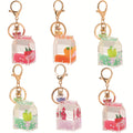 Wholesale Manufacture Acrylic Keyring Plastic Personalized Cute Floating Quicksand Milk Box Liquid Glitter Keychain