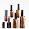 Factory Price Cosmetic Perfume Bottle Packaging Empty Round 30ml 50ml 100ml Amber Glass Face Serum Body Lotion Spray Pump Bottle