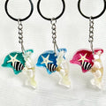 Wholesale Souvenirs Gift Souvenir Glow in Dark Dolphin Keychains with Sea Snail Tourist Souvenirs for Guest