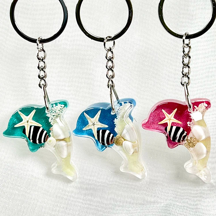 Wholesale Souvenirs Gift Souvenir Glow in Dark Dolphin Keychains with Sea Snail Tourist Souvenirs for Guest