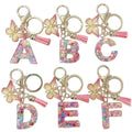 2023 New Resin Pink Heart Sequin Crystal Letter Keychain Romantic Sparkling Tassel Butterfly Pendant Keychain for Women Girls