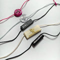 YH-ST05 New Design Factory Direct Custom Private Brand Logo Plastic Seal Lock Hang Tag String Snap Cord for Garment