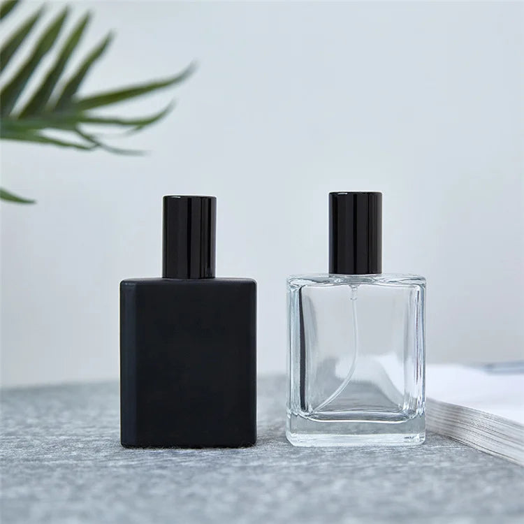 Luxury Unique 30ml 50ml clear Wholesale Oil Spray Black Bulk Empty Glass Refillable Perfume Bottle