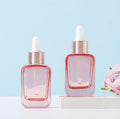 New Design 30ml Rose Gold Lid Skincare Serum Empty Empty pink Color Dropper Glass Bottle Essentials Oil