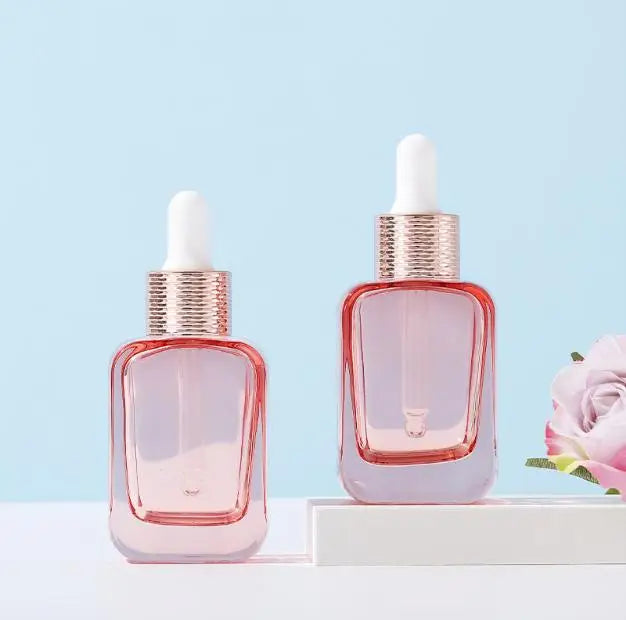 New Design 30ml Rose Gold Lid Skincare Serum Empty Empty pink Color Dropper Glass Bottle Essentials Oil