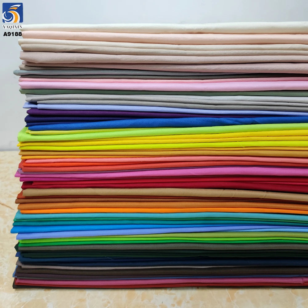 Guangzhou Supplier 400+Colors Woven Plain 100% Cotton Poplin Shirt Fabric for Dresses Clothing Textile