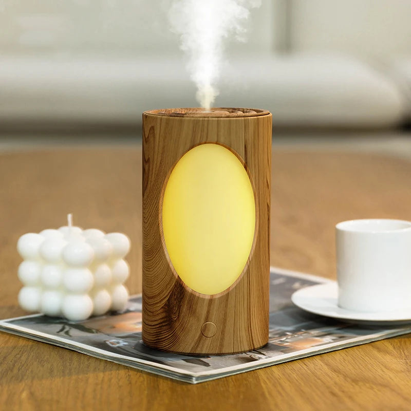 JAIYI 2025 USB Hydrating Charging Humidifier with Night Light Silent Aromatherapy Tree Hole Design for Home Bedroom