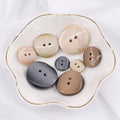 Hot Sale Stick Pattern Two Eyes Resin Wind Coat Woolen Sweater Coat Button for Sale