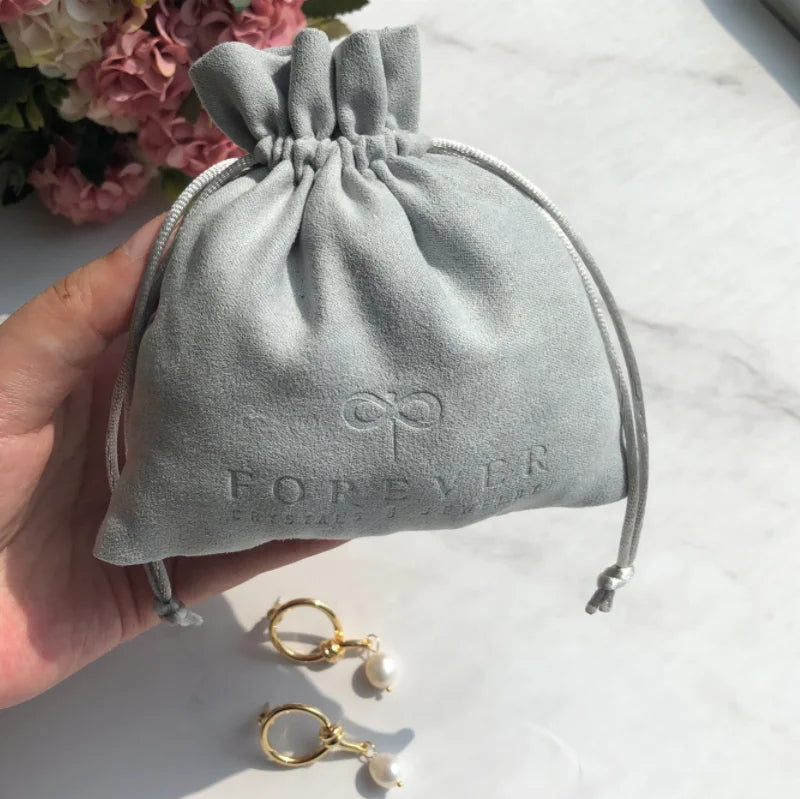 Custom Gray Suede Jewelry Pouch with Logo for Storing and Organizing Your Valuable Pieces