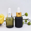 2oz Sloping Shoulder Olive Green Black Dropper Bottle Uv Glass Oval