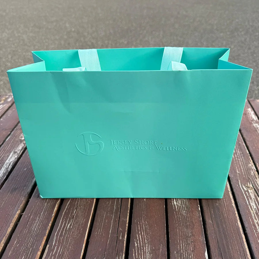 Customized Green Shopping Paper Bag With Gold Ribbon Handle for Boutique Retail and Brand Logo Printing