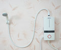 Factory sales bathroom kitchen under sink low power geyser instant tankless electric shower head hot 110v
