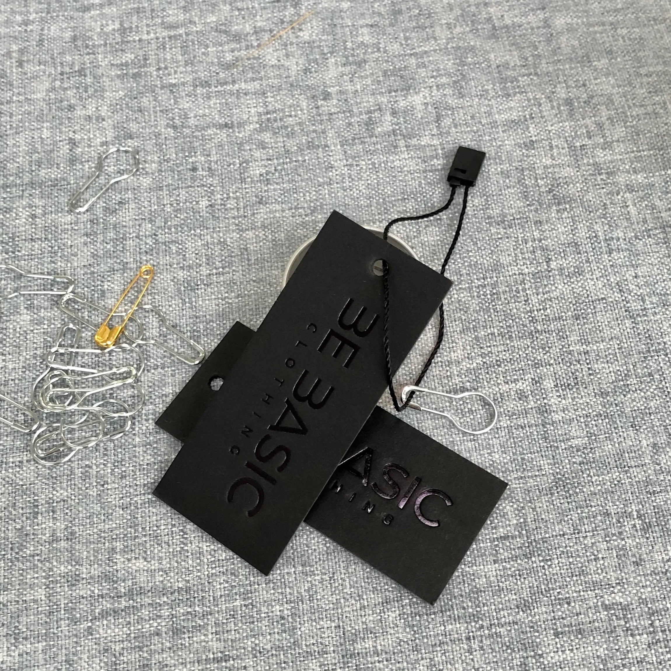 Luxury Customized Black Paper Tag Letterpress Embossed logo Garment Label Black Foil UV hang Tag with String for Clothing