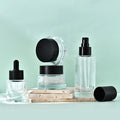 Black Lid 30ml 50ml Serum 100ml 150ml Lotion Toner Bottle Cylinder Glass Face Serum Lotion Cream Cosmetic Bottles and Jars Set