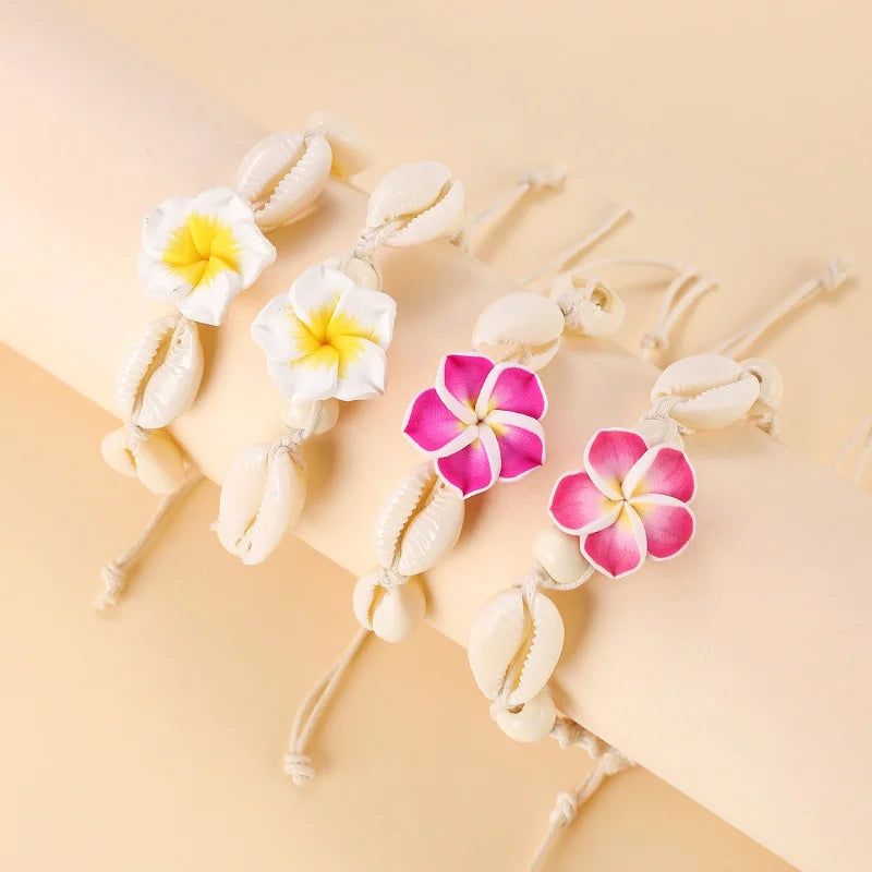 Handmade Boho Summer Holiday Beaded Bracelets Adjustable Woven Sea Puka Shell and Plumeria Frangipani Flower Charm