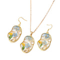 2023 New Fashion Jewelry Abstract Forget-me-not Face Gold Plated Earrings Necklace Hand Embossed Set