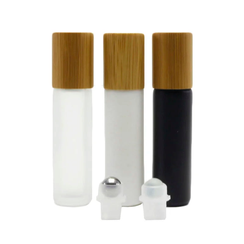 Wholesale Essential Oils Perfumes Round 10ml White Matte Black Frosted Glass Roll on Roller Bottles Bamboo Cap Metal