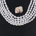 Zhuji Natural AA Color White Drop Baroque Freshwater Loose Pearls Strands for Sale