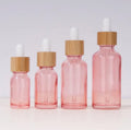 In Stock 5ml 10ml 15ml 20ml 30ml 50ml 100ml  Rose Gold/pink Glass Dropper Bottle With Bamboo Lid/dropper for Serum