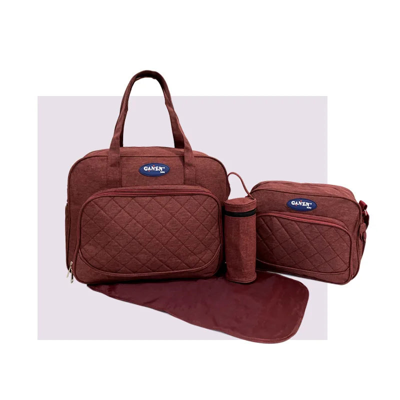 Latest Fashion Lady Waterproof 4-Piece Diaper Bag Set with Large Capacity and Changing Station