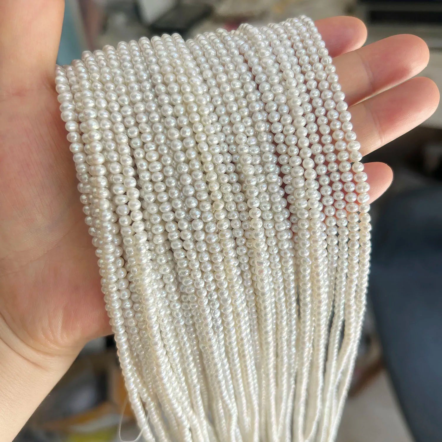 3-4 mm High Luster Mini Near Round Freshwater Pearl Loose in Strand Wholesale Natural Freshwater Pearl Strand with Nuclear
