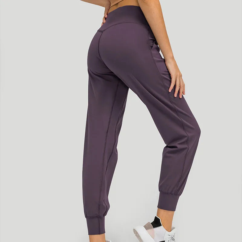 Hot Sale Solid Quick Dry Four-Way Stretch Breathable Full Length Fitness Pants Pocket High Elastic Soft Loose for Women Nylon