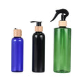 Empty Bamboo Cosmetic Packaging 50ml 100ml 250ml 500ml White Black Plastic Bottle with Bamboo Cap Pump