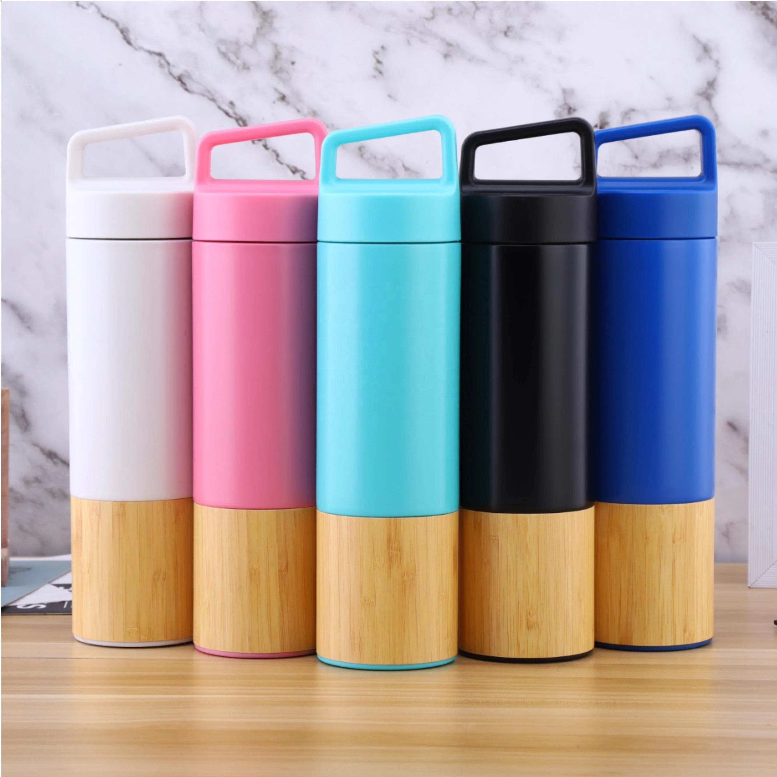 New Design Stainless Steel Double Wall Vacuum Insulated Leak-proof Eco-Friendly Portable 600ml Water Bottle Bamboo Surface 12-24