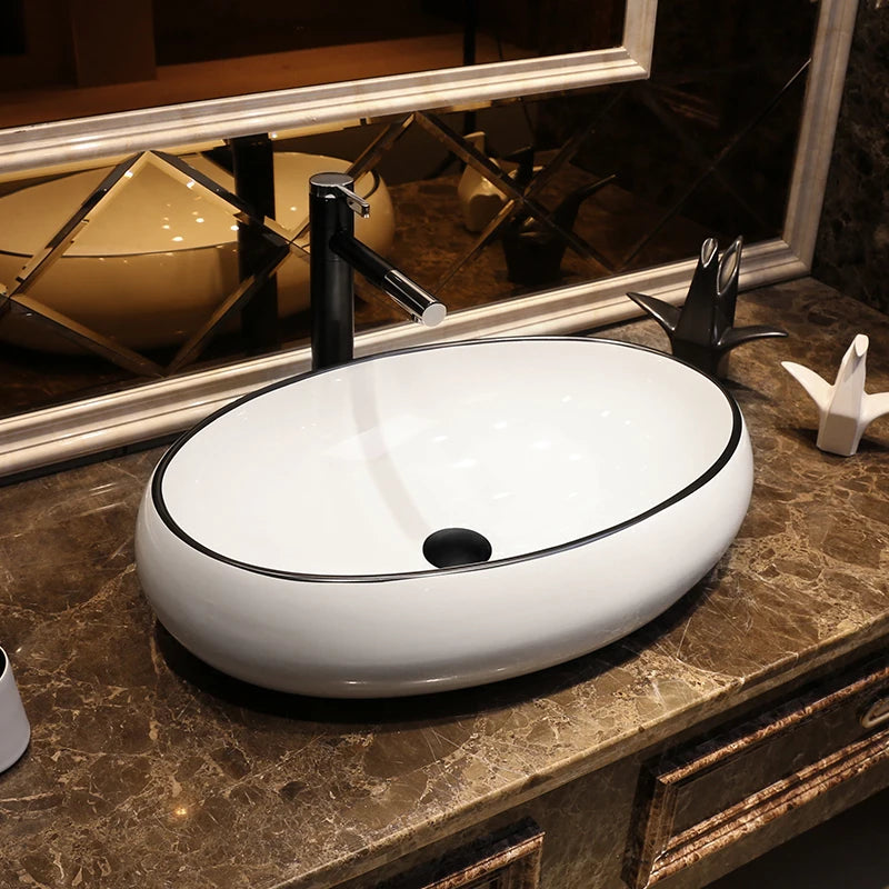 Wholesale Artistic White Oval Bathroom Basin Ceramic Art Basin Hand Wash Sink