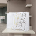 Wholesale Custom Logo Satin Rope Handle White Cardboard Paper Gift Bag With Gold Foil for Clothing & Shoes Packaging