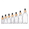 5ml 10ml 15ml 20ml 30ml 1oz 50ml 100ml Clear/amber/green/blue  Glass Dropper Bottles With Bamboo Pipette Dropper