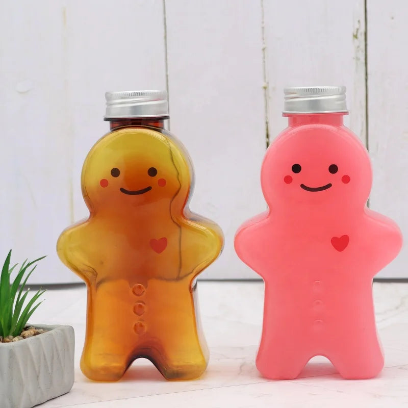 Special Design Plastic PET 500ml Juice Soda & Tea Cute Gingerbread Man Milk Bottle Silver Screw Caps with Eyes and Nose