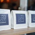 AT PACK 12oz 5lb Custom Design White/Black/Brown Kraft Paper Coffee Bags With Valve and Zipper for Coffee Bean Packaging
