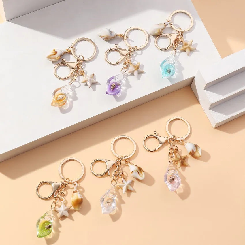 Hot Selling Creative Conch Starfish Acrylic Keychain Personalized Seaside Vacation Glow-in-the-Dark Conch Keychain