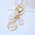 Wholesale Japan Oriental Cherry Cat Keychain Romantic Pink Flower Rabbit Pendant Enamel Animal Key Chains Girls Bag Accessories