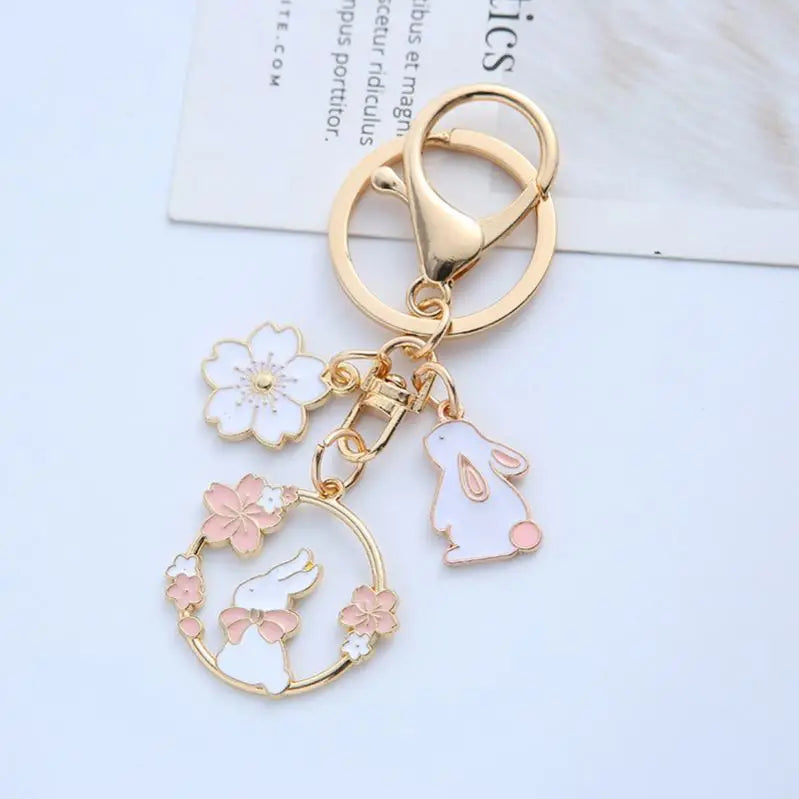 Wholesale Japan Oriental Cherry Cat Keychain Romantic Pink Flower Rabbit Pendant Enamel Animal Key Chains Girls Bag Accessories