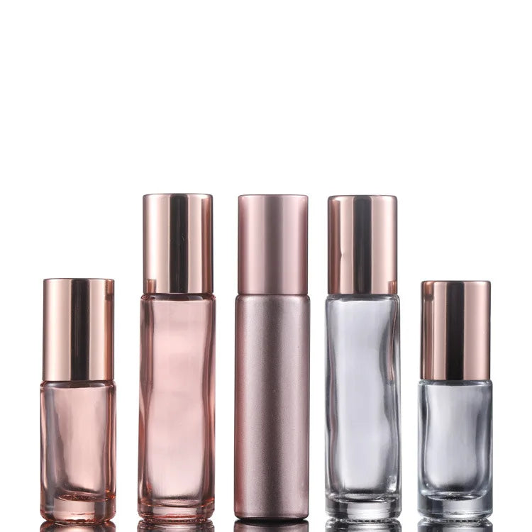 Wholesale Empty 5ml 10ml Round Rose Gold/Pink Perfume Oil Bottle Roller Glass Bottles for Essential Oil