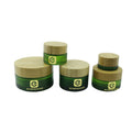 Wholesale Custom Green Glass Cosmetic Skincare Cream Jar with Bamboo Lid for Eye Cream 5g 15g 30g 50g 100g
