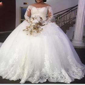 2024 Stunning Long Sleeve Pure White Ball Gown Wedding Dress Round Neck Plus Size Lace Appliques Princess Bridal Gown With Tail