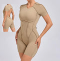 2025 Summer Beige Sports Bodysuit Short Sleeve Jumpsuit with Backless Neck Three-Dimensional Splicing for Gym Fitness & Yoga