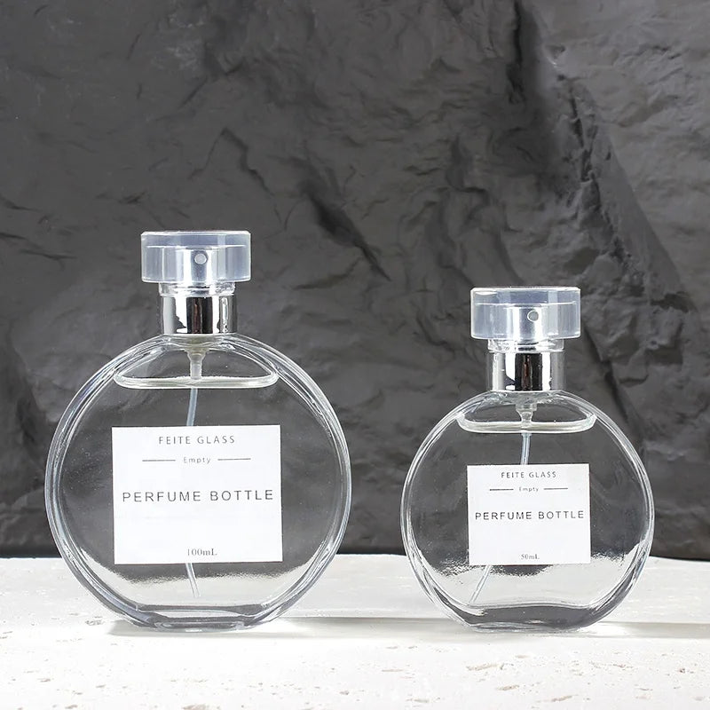 Manufacturer Wholesale 50ml 100ml Flat Round Perfume Bottle with Pump Cap and Pump Sprayer Glass Bottle
