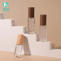 YAN Packaging Small Square Glass Perfume Bottle with Wood Cap 4ml 5ml 9ml 10ml Pump Sprayer Engraved Surface