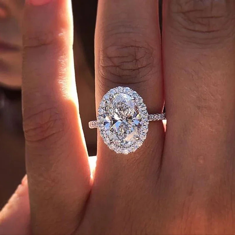 Huitan Wholesale OEM Classic Oval Design Sparkling Cubic Zirconia Rings Engagement Fashion Party Silver Plated for Women Bridal
