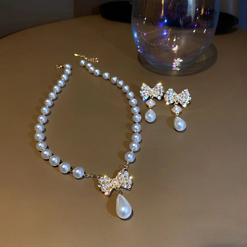 Wholesale Luxury Designer Bow Droplet Pearl Pendant Necklace Earrings Women's Retro Style High-quality Charm Fashion Jewelry Set