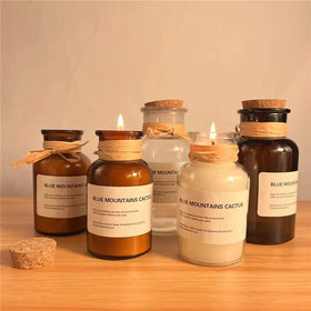 Custom logo 125ml 250ml 500ml 1000ml Clear/amber Glass Candle Container Glass Storage Bottles with Cork Stopper for Candles