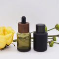 1ounce Slant Shoulder Olive Green Matt Black 30ml Glass Serum Bottle with Dark Wooden Texture Pump Closures