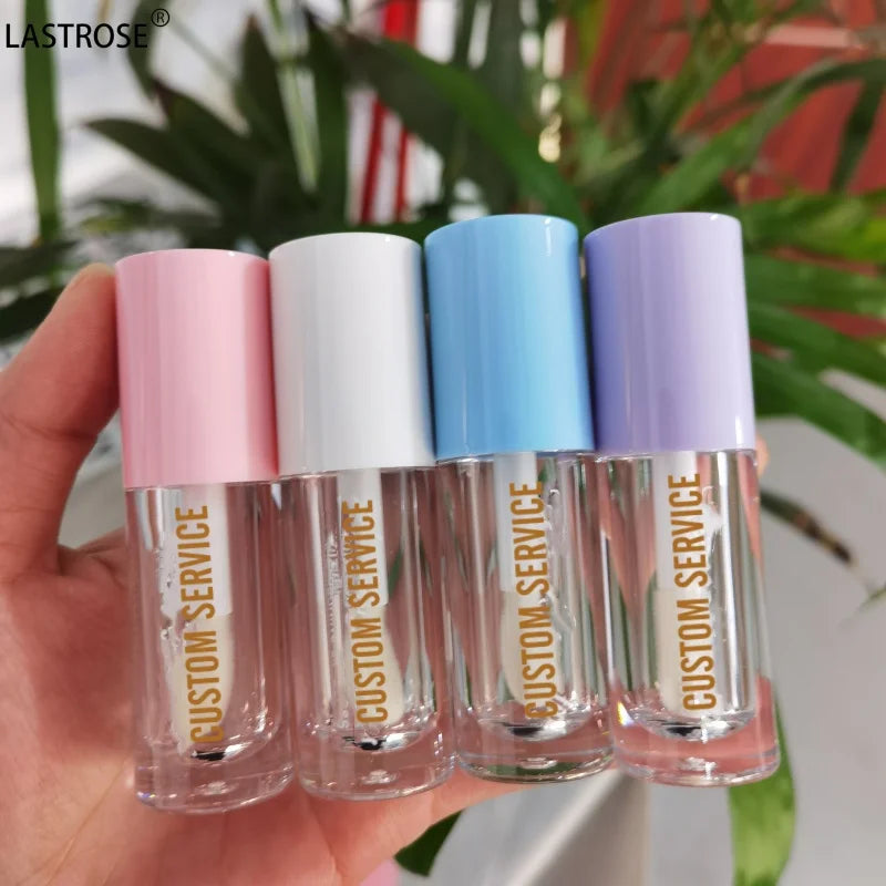 Wholesale Squeeze Tube Lip Gloss Lipgloss Tube Private Label Vegan Shiny Lips  Lip Gloss Oil With Pompom Keychain