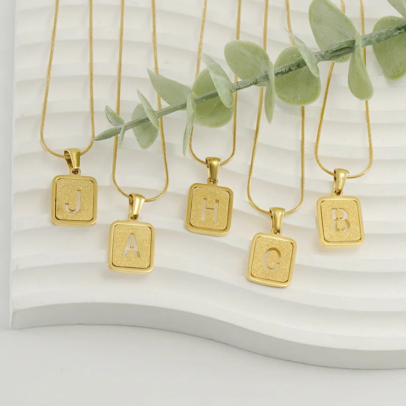 Wholesale 18K Gold-plated Stainless Steel 26 Letter Women's Fashionable Hollow square Pendant Snake Bone Chain Necklace Jewelry